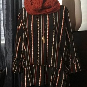 Ruffled blouse with great lines.